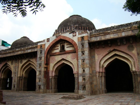 A view of Moth ki Masjid, with its blackened domes.