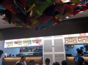 A ceiling installation at Yum Yum Cha: 250 origami butterflies.