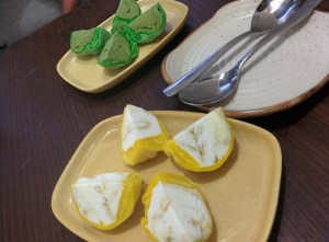 Mochi ice cream in two flavours: macha green tea, and coconut and jaggery.