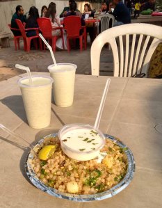 Sabudana khichri with raita, and mattha in the background.