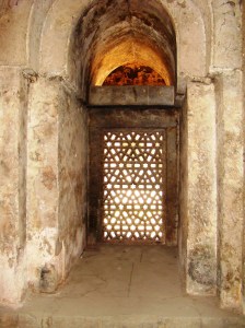 Inside the zenana masjid - a glimpse of a stone filigree screen, or jaali.