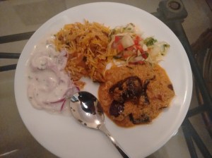 Kathal biryani, salad, onion raita, and baingan mirch ka salan.