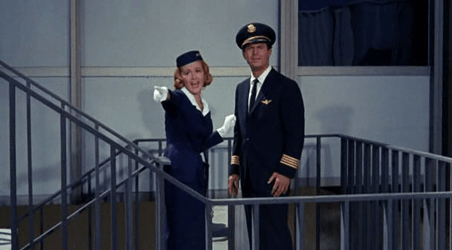 Adam is told of Mona's surprise for him