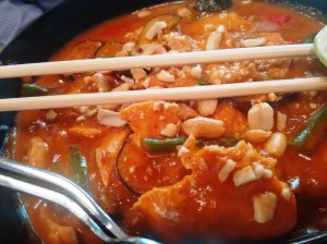 Mamagoto's Penang chicken curry meal in a bowl, served on rice.