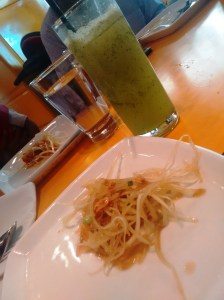 Lemon zest and mint lemonade, and a serving of som tam, raw papaya salad.