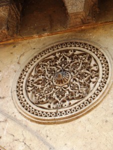 A decorative detail: a medallion made of incised plaster.