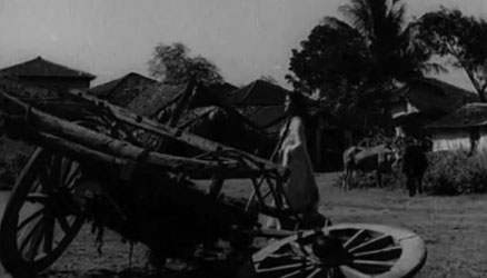 A frame from Taqdeer - a broken Sharda sets out