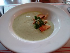 Chilled avocado and yoghurt soup with fresh cilantro and mint.