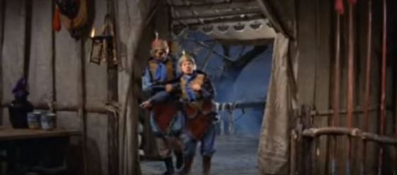 Mulan gets tipsy and is helped away by Ming