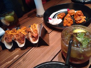 On the table: the lamb tacos, the tandoori soy chops, and the Italian smooch.