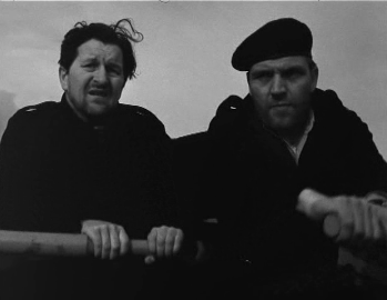 Baalsrud and a companion flee in a boat