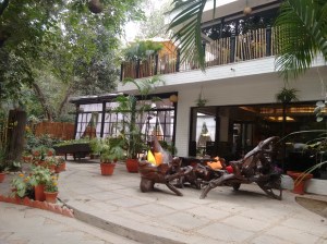 Looking towards the indoor seating, and some lovely driftwood-crafted furniture.