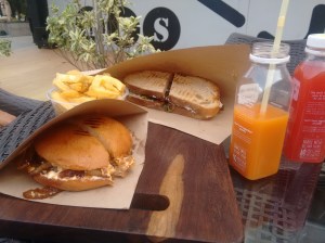 Sandwiches, fries and juice.