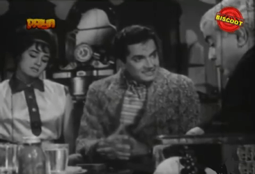 Ramesh plots with his mother and Mukta's father