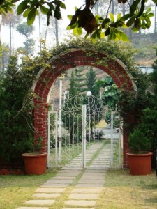 A gate leading from the Kafal Bagh to Harkison Hall.