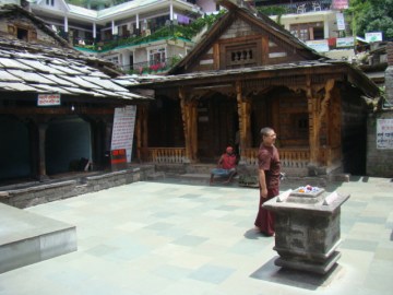 Vashist Temple. A Tibetan monk has a look-around.