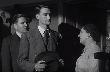 Lodge and his assistant talk to Mrs Finch