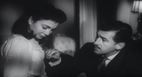 Adam comforts Evelyne