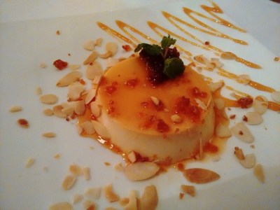 Panna cotta, with flaked almonds and pureed figs.