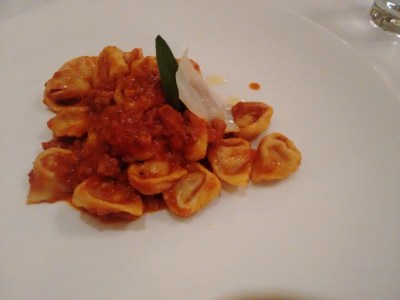 Tortellini stuffed with cured meats, served in a ragu sauce. 