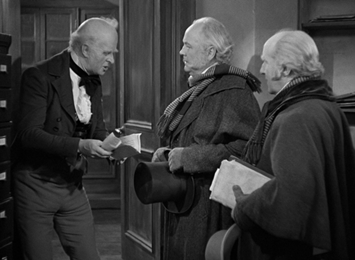 Scrooge is rude to a couple of charity-seekers