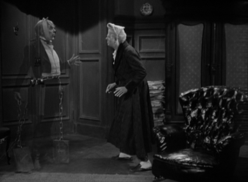 Marley appears to Scrooge, warning him of what is to come