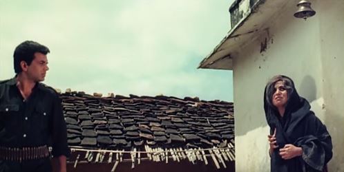 Purnima and Dharmendra in a scene from Mera Gaon Mera Desh