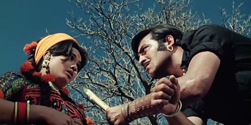 Vinod Khanna and Laxmi Chhaya in a scene from the film
